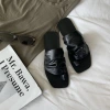 The new design of the flip-flops with a square head, pleats and a flat bottom with a pair of flip-flops for women to wear outside in summer Application Scenario